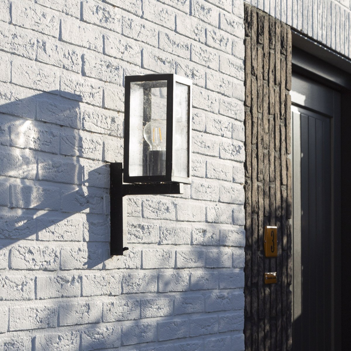 Moderne Außenwandleuchte Huizen Schwarz stilvoll und im Trend Außenlampe klaren Verglasung